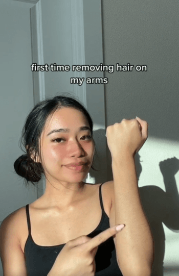 User holding Shevra product near face - Poster